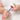 Person using a needle-free bottle adaptor with a Luer-lock syringe and VetIMMUNE PI bottle for dispensing.
